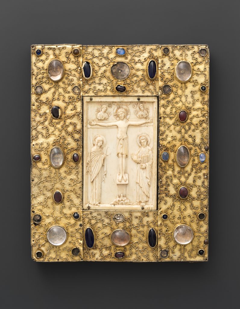 Book Cover with Byzantine Icon of the Crucifixion. Constantinople ivory dates to 1000, late 11th century Spanish setting of silver-gilt with pseudo-filigree, glass, crystal, and sapphire cabochons. Photo courtesy of the Metropolitan Museum of Art, New York,